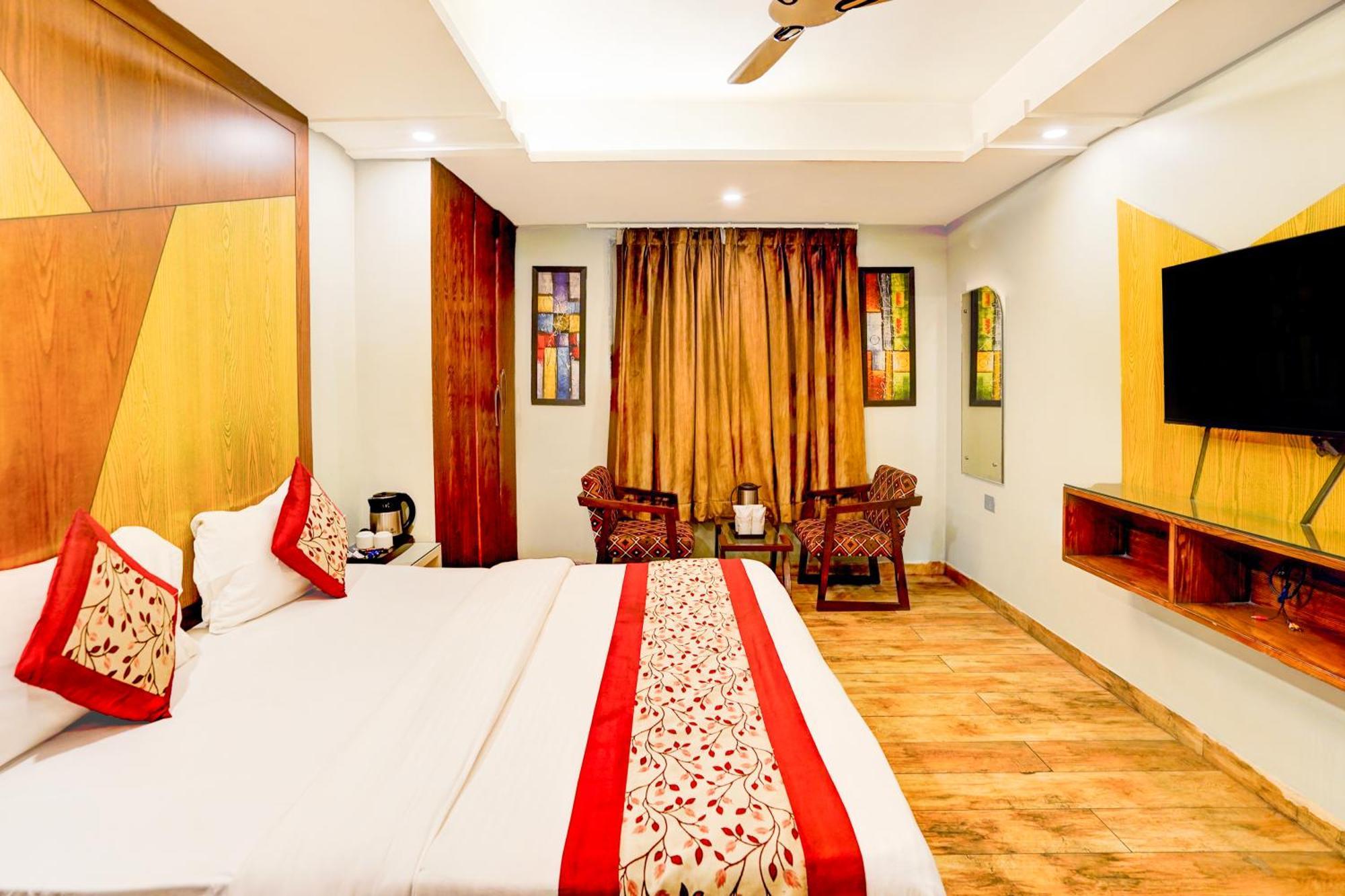 Hotel Staybook Nitya Maharani Free Airport Pickup