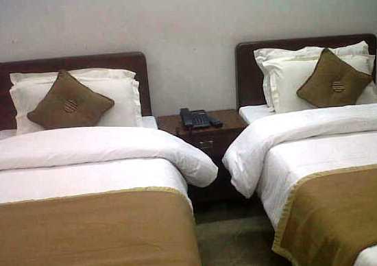Om Palace Inn