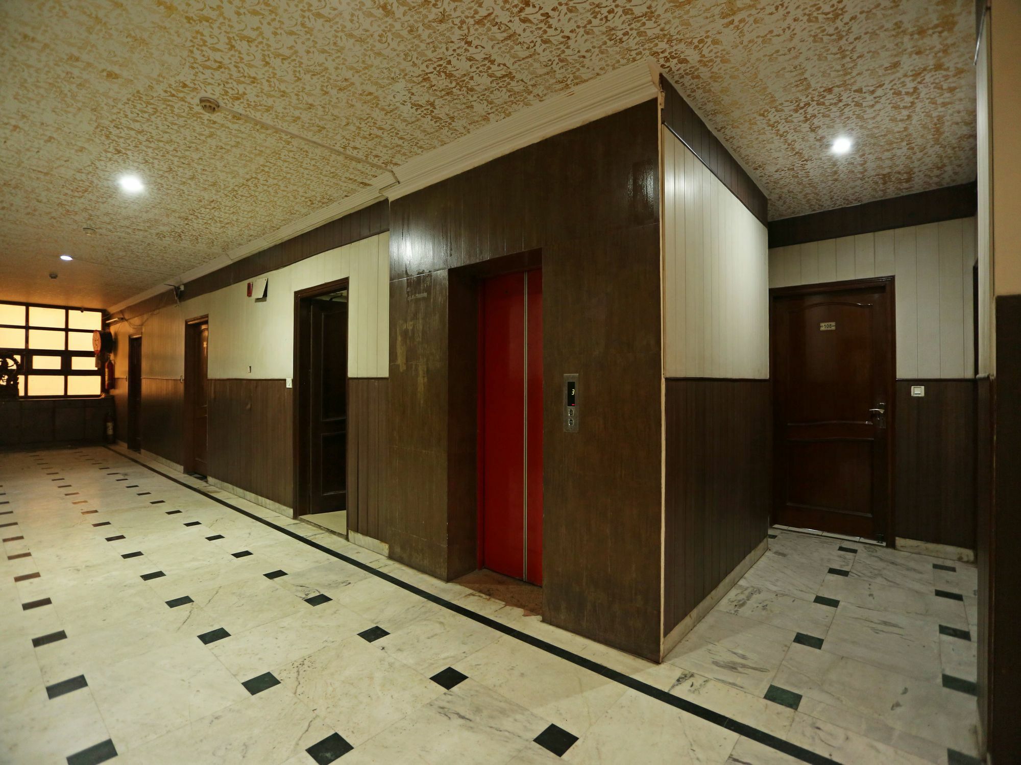 Hotel Capital O Orchid Garden Near Satyam Inox Patel Nagar