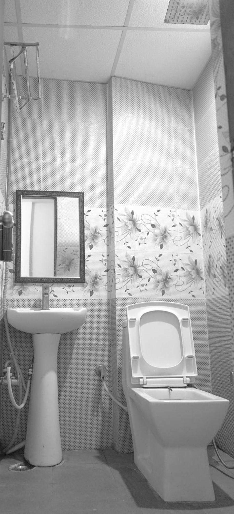Roomshala 126 Mannat Laxmi Nagar Hotel