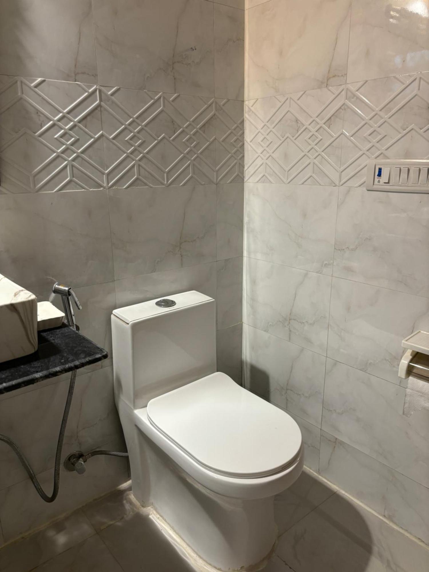 Atharva's By Goaround Homes - Nehru Enclave Metro, South Delhi *