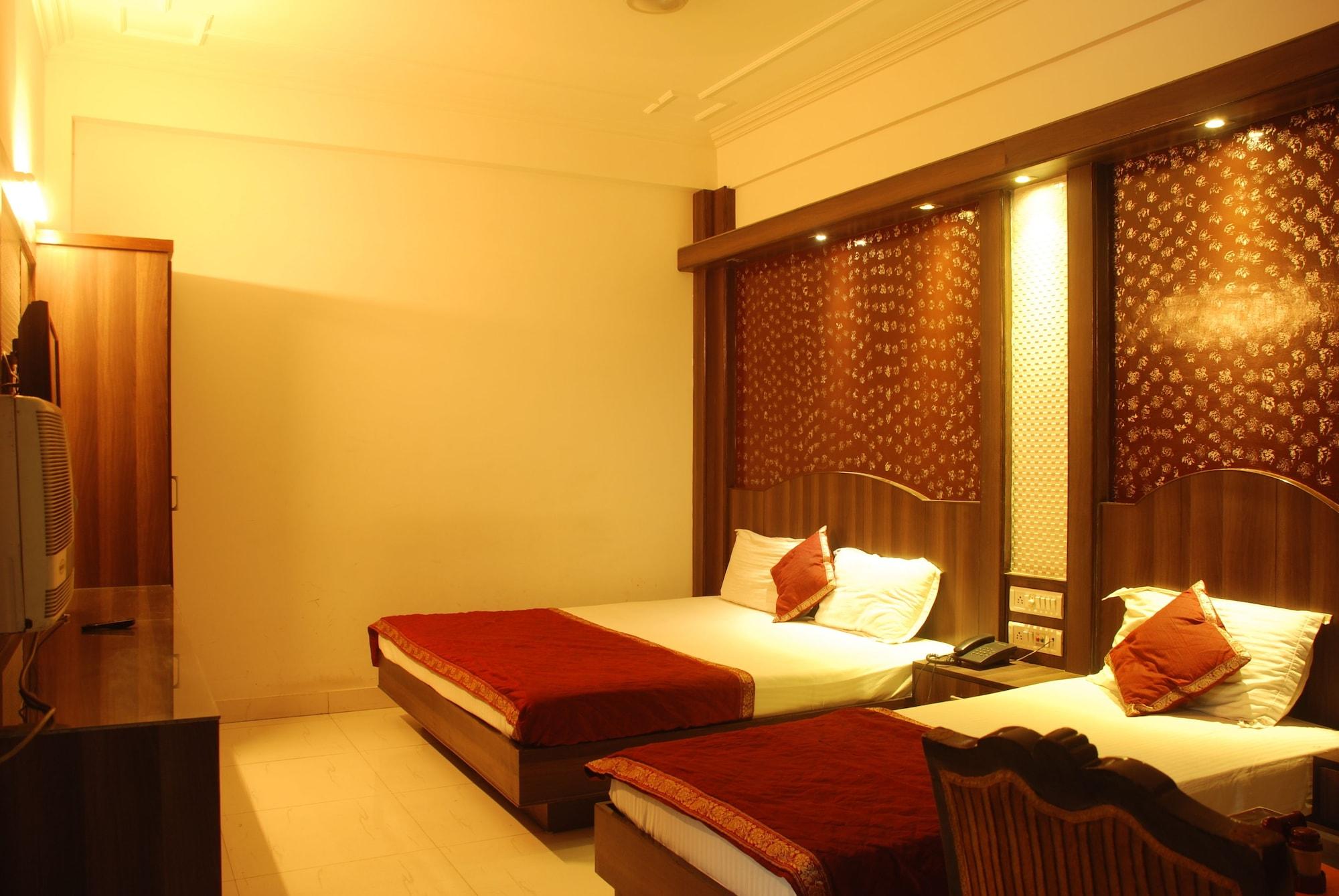 Baba Deluxe Near Railway Station And Center -by Rcg Hotel