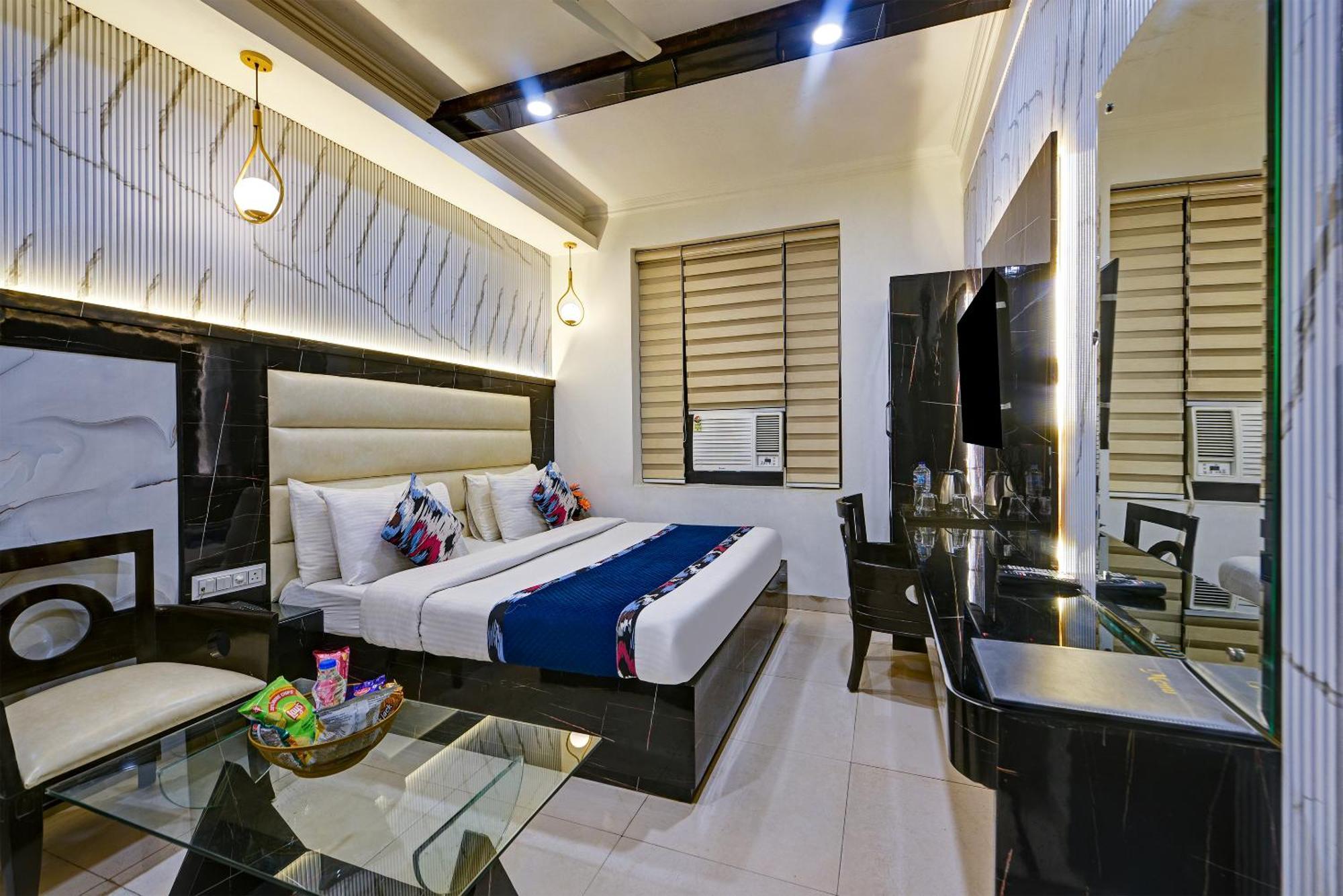 Baba Deluxe Near Railway Station And Center -by Rcg Hotel